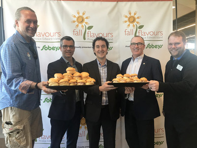 "Serving up Lobster Rolls at Sobeys Extra in Stratford to celebrate big announcements for Fall Flavours"
(Left to Right) Chef Michael Smith (PEI Food Ambassador), Michael MacKinnon (Atlantic Lottery), John Rowe (Food Island Partnership), The Honourable Chris Palmer (Minister of Economic Development and Tourism), Matt Gauthier (Sobeys Extra Stratford Store Manager) (CNW Group/Fall Flavours Culinary Festival)