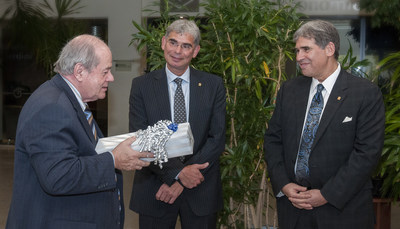 Léopold Beaulieu, president and CEO of Fondaction (left), joins Stephen and Peter Hart (right), owners of Rideau Recognition Solutions, in this file photo from the 2012 centennial celebrations of the founding of Rideau, in Montreal. Rideau announced, June 26, 2018, a significant investment from a group of institutional investors led by Fondaction for support of the company’s projects in innovation and expansion into new markets, regions and service areas. (CNW Group/Rideau Recognition Solutions)