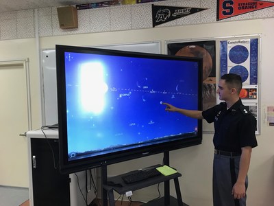 Student demonstrates the Planetarium Software that predicts the location of planets and stars at specific dates and times.