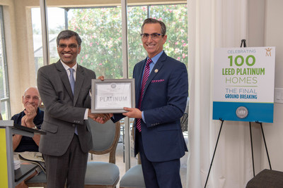 Mahesh Ramanujam, USGBC president and CEO, presenting Marshall Gobuty with Mirabella's 100th LEED Platinum Certification.