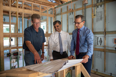 From left: Jim Dick, Director of Building Operations at Mirabella, with Mahesh Ramanujam, USGBC president and CEO, and Marshall Gobuty, president of Mirabella.