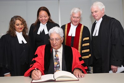 The Honourable Leonard S. Mandamin (centre) signs the Law Society of Ontario’s Honorary LLD Register at the Call to the Bar ceremony on June 26, 2018 in Toronto. He received the honorary degree from the Law Society for his work as a highly respected and dedicated leader within the legal profession and the Indigenous community. Left to right: Law Society Benchers Isfahan Merali and Dianne Corbiere, Treasurer Paul Schabas and The Honourable Paul S. Rouleau, Court of Appeal for Ontario. (CNW Group/The Law Society of Ontario)