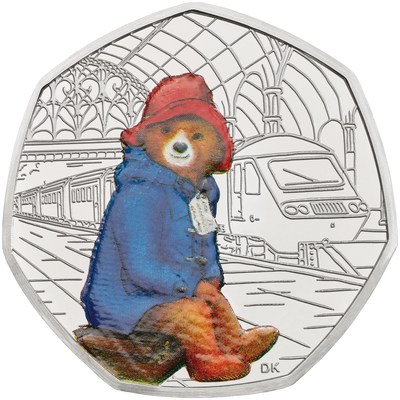 The Royal Mint has revealed two new limited edition Paddington Bear coins to celebrate the 60th anniversary of Paddington Bear’s first adventure in A Bear Called Paddington. (PRNewsfoto/The Royal Mint)