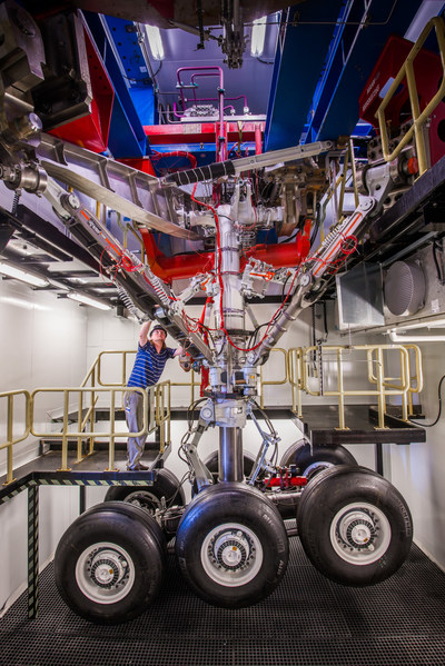 A technician prepares UTC Aerospace Systems’ A350-1000 main landing gear for retraction endurance and environmental testing at the company’s Oakville, Ontario facility. Photo credit: UTAS. (CNW Group/Airbus)