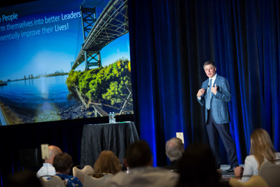 Rob Siegfried, CEO and Founder of The Siegfried Group, LLP, addresses the crowd at the company's recent MY Journey® event.
