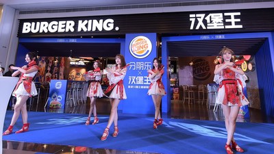 Popular girl group SING from the reality show Produce 101 performing during the opening ceremony of the campaign at a Burger King store in Shenzhen, China.