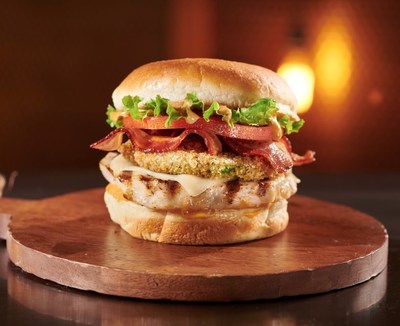 BurgerFi's new sandwich features an all-natural, free-range grilled chicken breast stacked with fried avocado,white cheddar, bacon, lettuce, tomato and honey mustard-BBQ Sauce.