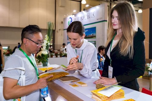 Visitors of the exhibition are interested in products of the Russian timber industry (PRNewsfoto/Russian Export Center)