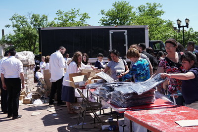 Kars4Kids volunteers distributing some of the 1000s of items given to members of the Lakewood community and greater Ocean County on June 12. Items distributed included supplies for teachers, seat cushions for seniors, toys, small kitchen appliances and children's clothing.