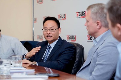 Hu Huai Ban, General Manager of Overseas Markets (left), Yutong Bus and Alexander Strukov, Founder of BBus (right)