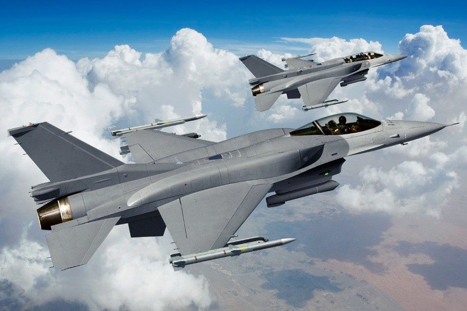Raytheon's partnership with BAE Systems provides pilots with real-time, mission critical information using its projector for BAE Systems' Digital Light Engine head-up display on the UAE's F-16.  (Photo: Lockheed Martin)