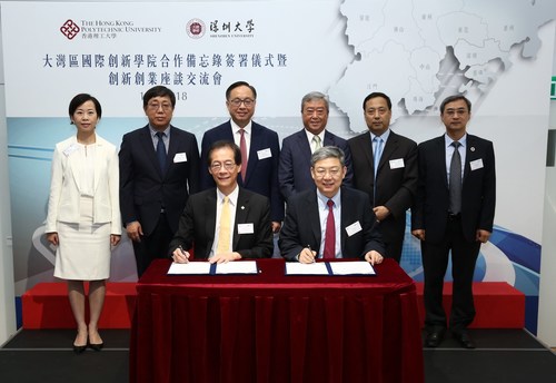 Professor Timothy W. TONG (left, front row), President of PolyU, and Professor LI Qingquan (right, front row), President of SZU, signed the MoU for the establishment of the International Institute for Innovation. The ceremony was witnessed by Mr Nicholas W. YANG, Secretary for Innovation and Technology; Mr CHAN Tze-ching , Council Chairman of PolyU (3rd & 4th from left, back row); Dr Miranda LO, Executive Vice President of PolyU; Mr SHA Xinhua, Associate Counsel, Shenzhen Science, Technology and Innovation Commission; Mr ZHANG Zongming, Associate Counsel, Education, Science and Technology Office, Liaison Office of the Central People’s Government in the Hong Kong SAR; and Professor WANG Hui, Vice President of SZU (1st, 2nd, 5th & 6th from left, back row). (PRNewsfoto/PolyU)