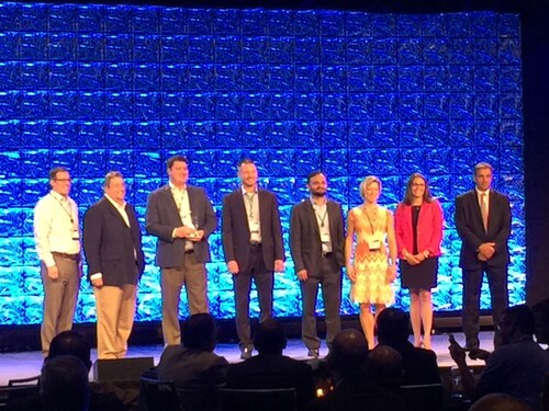 The Alitek team receiving Top Implementation of the Year Award at Open Text Enterprise World 2018