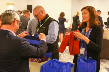 Michelle Borré, Portfolio Manager, Oppenheimer Fundamental Alternatives Fund and Oppenheimer Capital Income Fund, assembles care packages at the firm’s Distribution Symposium in Chicago. (PRNewsfoto/OppenheimerFunds)