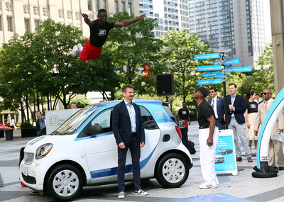 Global CEO of car2go Group GmbH and the Jesse White Tumblers kicking off car2go launch in Chicago on July 25 - Photo Credit: Getty Images