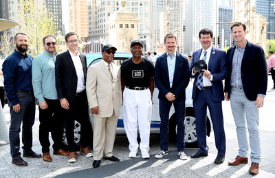 Celebrating the launch of car2go service in Chicago on July 25: Mike Mikos, CFO car2go N.A., Mike Silverman, Communications Director car2go N.A., Dr. Sebastian Dehnen, Global CFO of car2go Group GmbH, Alderman Walter Burnett, Jesse White, Secretary of State of Illinois, Olivier Reppert, Global CEO of car2go Group GmbH, Alderman Brian Hopkins, Paul DeLong, CEO of car2go N.A. - Photo Credit: Getty Images