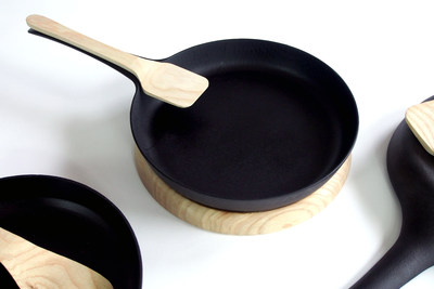 Ironwood Skillet with Nestled Spoon and Trivet