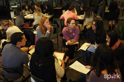 Spark Investment Committee - Young philanthropists reviewing women's grassroots projects to support (PRNewsfoto/Blossom)