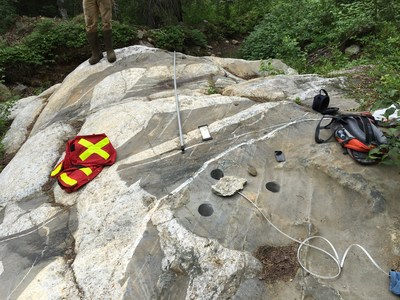 Taking groundwater level measurements and conducting permeability tests on boreholes at Georgia Lake. (CNW Group/Rock Tech Lithium Inc.)