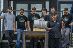 Guinness Brewmaster Peter Wiens and his team tap a ceremonial firkin in celebration of the Open Gate Brewery & Barrel House ribbon-cutting ceremony on August 2, 2018 in Halethorpe, Maryland.