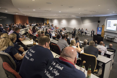 Josh Cramer of the SME Education Foundation (right) addresses community and industry leaders and educators at the 2018 NC3 Leadership Summit. (Photo: Gateway Technical College)