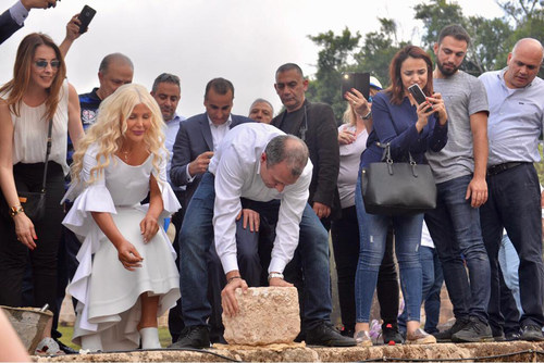 Michigan Accident Attorney Joumana Kayrouz (2nd from left) joins Gebran Bassil, Lebanon's Minister of Foreign Affairs and Emigrants, to place the first stone in the groundbreaking for a new Youth Hub Center to be opened in Batroun, Lebanon in the Spring of 2019