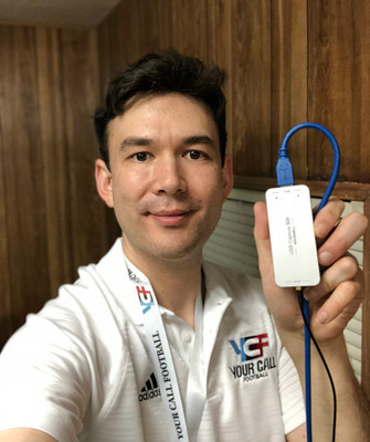 Phenix Senior Engineer Aaron Barlow with a Magewell USB Capture SDI device during the live streaming production of interactive sports experience Your Call Football.