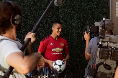 • Manchester United forward, Alexis Sanchez, smiles down the lens during a Chivas film shoot in July in Los Angeles, United States. The film was released to announce Chivas as the "Official Global Spirits Partner" of Manchester United.