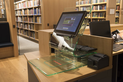 When the New Library extension was built, D-Tech provided an additional self-service unit to accelerate the borrowing/return processes and allow students to do both whilst downstairs in the New Library (PRNewsfoto/D-Tech International)