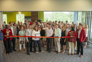 Ribbon-cutting ceremony held for new SageSure Insurance Managers office