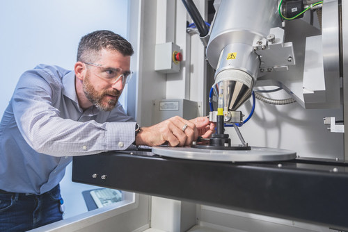 Dr. Fabrice Bernier, researcher at the NRC, uses an X-ray micro-tomography machine to analyze powders used in 3D printing. (CNW Group/National Research Council Canada)