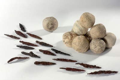 Arrowheads and slingstones from Lachish on display at Armstrong Auditiorium.