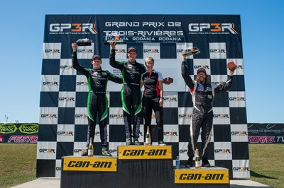 Zacharie Robichon led the GP3R race of the Porsche GT3 Cup Challenge Canada on Sunday, while Roman De Angelis crossed the line second, and Platinum Masters winner Étienne Borgeat in the final podium position. Jennifer Cooper from Porsche Cars Canada, Ltd. is also seen as she presented the podium awards. (CNW Group/Porsche Cars Canada)