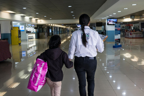 Unaccompanied migrant children who were found traveling alone with human smugglers known as coyotes and subsequently deported back to Guatemala by Mexican authorities are led through Guatemalan immigration to be reunited with their families at La Aurora International Airport, Guatemala City, Guatemala on May 1, 2018. © UNICEF/UN0217822/Bindra (CNW Group/UNICEF Canada)
