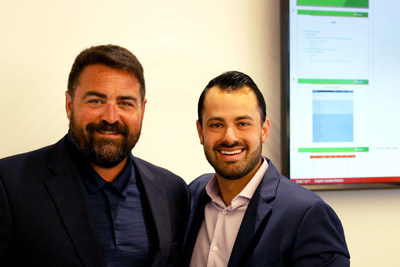 Brian Shanahan and Jon Halpern share a moment of congratulations over the successful completion of the Transax acquisition - Pineapple Payments' fifth acquisition in 2018.