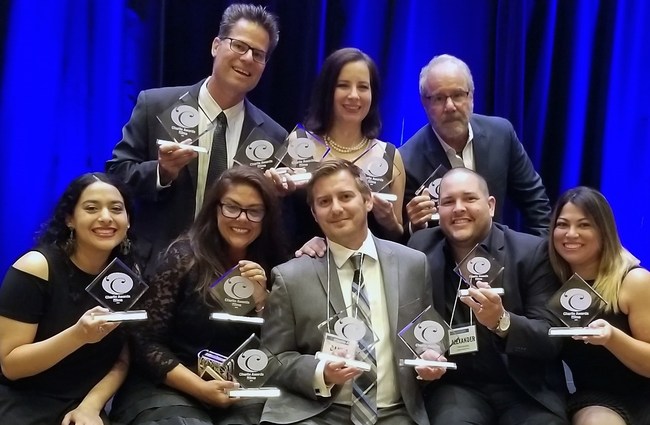 Lifestyle Media Group poses with their awards.