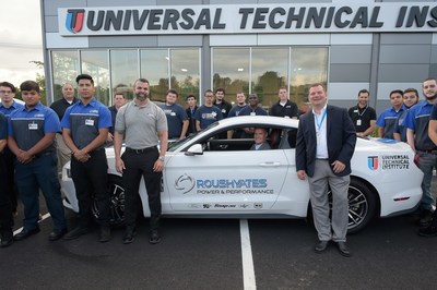 The inaugural class at UTI-Bloomfield with campus president Steve McElfresh (in vehicle)