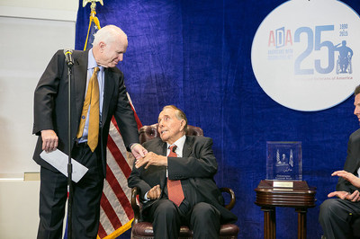 The late Senator John McCain pictured with former Senator Bob Dole at Paralyzed Veterans of America's 25th anniversary celebration of the ADA in 2015.