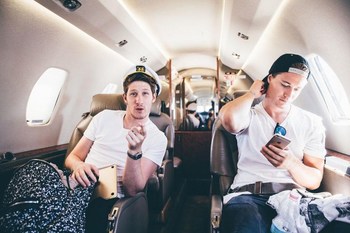 Two of Liquid I.V.’s newest investors, Myles Shear (left) and Kygo (right), travel the world together touring.