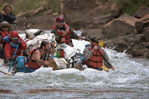 A team of wounded combat veterans paddled down the raging Colorado River during a previous Raytheon-No Barriers Grand Canyon Veteran Wilderness Expedition.
