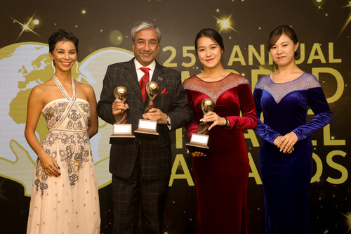 Sandeep Dayal, head, sales, Cox & Kings displaying the trophies at the 25th Annual World Travel Award held at InterContinental Grand Stanford, Hong Kong. Cox & Kings bagged three titles namely, Asia's Leading Luxury Tour Operator, India's Leading Tour Operator and India's Leading Travel Agency. (PRNewsfoto/Cox & Kings Ltd)