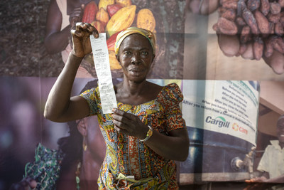 Farmers with receipts for payments. (PRNewsfoto/Cargill)