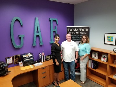 Navy veteran and Elevated Technologies founder Jason Rorie (center) provides pro bono IT assistance to Grace After Fire and fellow Navy veterans Mea Williams, president and CEO of Grace After Fire (left of Rorie) and the organization’s Houston outreach coordinator, Tana Plescher (right of Rorie).