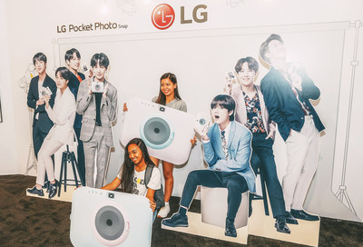 Fans of BTS enjoy the LG Pocket Photo Snap at the “BTS Studio Presented by LG”