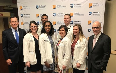 Brian Gragnolati, President and CEO, Atlantic Health System (L) and Stephen K. Klasko, MD, MBA, President, Thomas Jefferson University and CEO, Jefferson Health (R), stand with the first LIC students of the Sidney Kimmel Medical College Regional Campus at Atlantic Health System