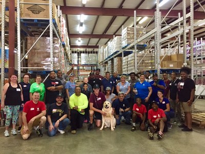 Warriors gather to pack 700 meals during food bank volunteer program