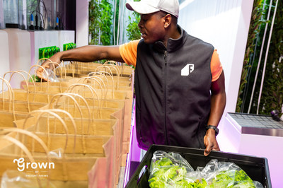 Joshua Fiagbedzi, one of the first Grown farmers, packs farm shares mere minutes after harvest. More than 50 customers will enjoy his crop, grown by a farmer they know, transported just 100 yards from farm to fork.