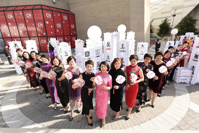 "Chinese Beauties" wearing cheongsams at the exhibition.