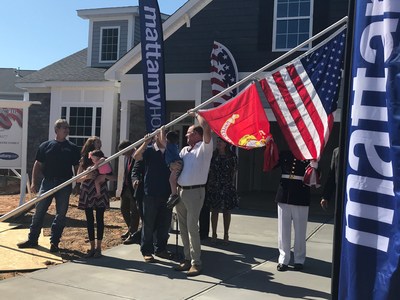 Mattamy Homes and Operation: Coming Home hosted a flag raising ceremony at Hero Home, currently under construction, for Purple Heart recipient, US Marine Corps Corporal (Cpl.) Nate Rogers and his family in Raleigh on Sept. 11, 2018. (CNW Group/Mattamy Homes Limited)