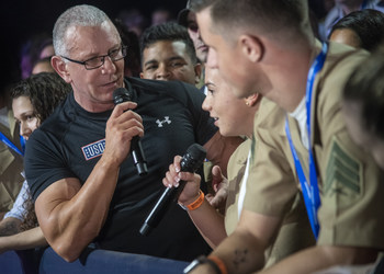 Chef Robert Irvine addresses a service member at the World's Biggest USO Tour in Washington, D.C., Sept. 12, 2018. DoD Photo by Navy Petty Officer 1st Class Dominique A. Pineiro.
